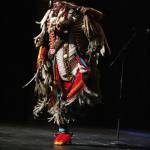 Joshua Atcheynum performs a dance called Custers Last Stand on Thursday, Sept. 6, 2018 at the Homer High School Mariner Theatre in Homer, Alaska. (Photo by Megan Pacer/Homer News)