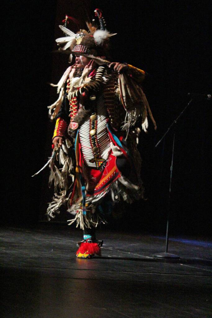 Joshua Atcheynum performs a dance called Custers Last Stand on Thursday, Sept. 6, 2018 at the Homer High School Mariner Theatre in Homer, Alaska. (Photo by Megan Pacer/Homer News)