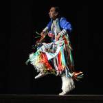 Larry Yazzi performs a dance for a small crowd Thursday, Sept. 6, 2018 in the Homer High School Mariner Theatre in Homer, Alaska. Yazzis group, the Native Pride Dancers, traveled from Minnesota to performs in several schools and venues on the Kenai Peninsula. Their visit was made possible by the by the Native Youth Community Project. (Photo by Megan Pacer/Homer News)