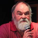 Ken Castner III answers a question at a city council and mayoral candidate forum Tuesday, Sept. 11, 2018 at Alices Champagne Palace in Homer, Alaska. Castner is running for Homer mayor. (Photo by Megan Pacer/Homer News)