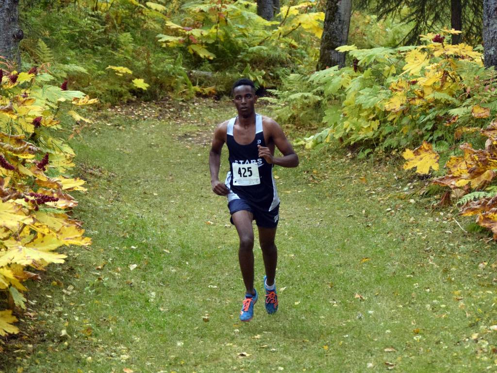 Soldotnas Mekbeb Denbrock lead the boys race at the Kenai Peninsula Borough cross-country meet Saturday, Sept. 15, 2018, in Nikiski. (Photo by Jeff Helminiak/Peninsula Clarion)