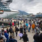 Cruise ship visitors gather for their tours on the Seawalk on Wednesday, Sept. 13, 2017. (Michael Penn | Juneau Empire File)