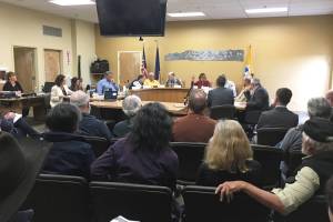 Homer area residents listen to the Tuesday, Sept. 18, 2018 Kenai Peninsula Borough Assembly meeting at Homer City Hall in Homer, Alaska. (Photo by Megan Pacer/Homer News)