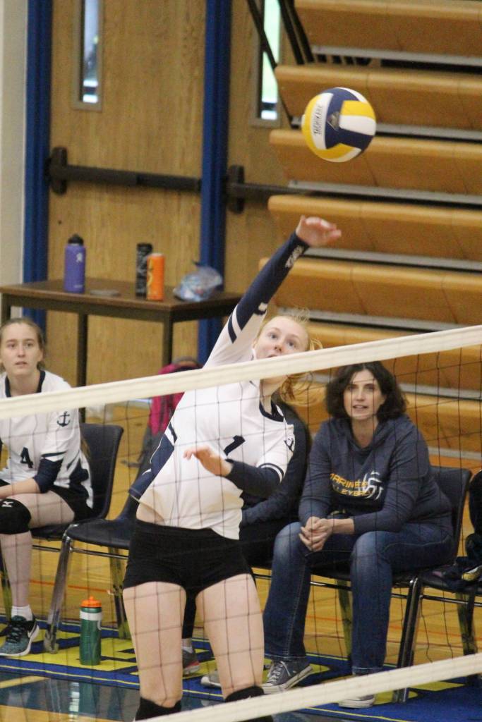 <span class="neFMT neFMT_PhotoCredit">Photo by Megan Pacer/Homer News</span>                                Homers Kelli Bishop spikes the ball to the Seward Seahawks during a game Saturday, Sept. 22, 2018 in the Alice Witte Gymnasium in Homer, Alaska.