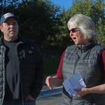 Homer City Council member Shelly Erickson speaks about the Greatland Street expansion and how it came to fruition after the idea was brought to her by Save-U-More Assistant Manager Brian Nahmis, left, during a grand opening ceremony Tuesday, Sept. 25, 2018 in Homer, Alaska. (Photo by Megan Pacer/Homer News)