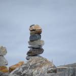 Two rock sculptures are part of dozens an artist made along the Homer Spit last week, as seen in this photo taken Friday, Sept. 21, 2018, in Homer, Alaska. (Photo by Michael Armstrong/Homer News)