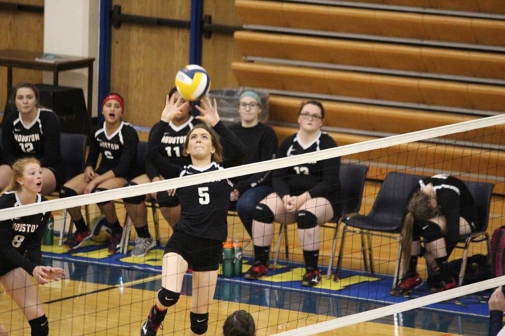 Houston High Schools ????? sets the ball over the net during Homers game against them Saturday, Sept. 29, 2018 in Homer, Alaska. (Photo by Megan Pacer/Homer News)