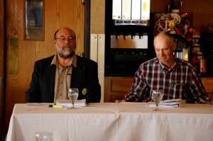 Kenai Borough Assembly member Willy Dunne, left, and Troy Jones, right, listen to a question at a forum on Monday, Oct. 1, 2018, for the District 9 assembly race at the Best Western Inn, Homer, Alaska. Jones is challenging Dunne for the seat. (Photo by Michael Armstrong/Homer News)