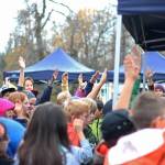 Students from Chapman School and Fireweed Academy raise their hands to answer a question about salmon during an educational egg take trip Thursday, Oct. 4, 2018 at the Anchor River in Anchor Point, Alaska. (Photo by Megan Pacer/Homer News)