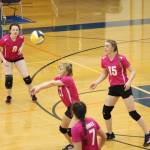 Sela Weisser digs a serve while her teammates prepare for their next move during their game against Soldotna High School on Tuesday, Oct. 9, 2018 at Homer High School in Homer, Alaska. (Photo by Megan Pacer/Homer News)