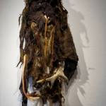 Keren Lowells Rough Beast, part of her show at Bunnell Street Arts Center as seen at the First Friday, Oct. 6, 2018, opening in Homer, Alaska. The title refers to a line in Willam Butler Yeats poem Second Coming: And what rough beast, its hour come round at last / slouches its way to Bethlehem to be born? Many of Lowells garments have poetic references. (Photo by Michael Armstrong/Homer News)
