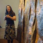 Keren Lowell speaks about her show at Bunnell Street Arts Center for its First Friday, Oct. 6, 2018, opening in Homer, Alaska. (Photo by Michael Armstrong/Homer News)
