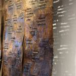 A close up of Keren Lowells Groundwork show the textile art casting shadows on the wall of Bunnell Street Arts Center at the First Friday, Oct. 6, 2018, opening of Lowells show in Homer, Alaska. (Photo by Michael Armstrong/Homer News)