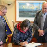 Valerie Davidson, left, takes the oath of office as Alaskas lieutenant governor on Tuesday, Oct. 16, 2018 from Gov. Bill Walker in Anchorage. (Office of the Governor | Courtesy photo)