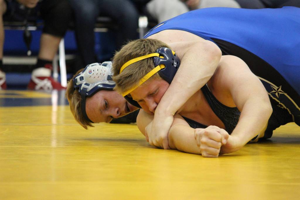 Soldotnas Sean Babitt controls Homers Ryan Hicks during their 171-pound weight class bout Friday, Oct. 19, 2018 at Homer High School in Homer, Alaska. Babitt went on to win the encounter. (Photo by Megan Pacer/Homer News)