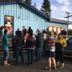 Movie lovers wait outside of Barbs Video and DVD before it opens Saturday, Oct. 20, 2018 in Homer, Alaska. Saturday was the first day of a sale of the Barbs merchandise. The business will officially close on Oct. 31. (Photo by Megan Pacer/Homer News)