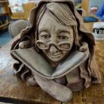 Barbara Jo Auburn House made this sculpture of Homer Bookstore matriarch Joy Post. Post died in November 1995, but her legacy continues with co-owners Lee and Sue Post, her children, and Jennifer Stroyeck. The photo was taken in Homer, Alaska, on Oct. 29, 2018. (Photo by MIchael Armstrong/Homer News)