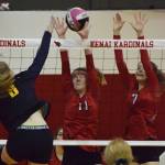 Kenai teammates Kailey Hamilton (11) and Lexi Reis (7) put up a block against Homers Karmyn Gallios, Friday, Oct. 26, 2018 at Kenai Central High School in Kenai, Alaska. (Photo by Joey Klecka/Peninsula Clarion)
