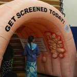 Fairgoers investigate Nolan the Colon, an inflatable tunnel used to teach colon health, at this years Rotary Health Fair on Saturday, Nov. 3, 2018 at Homer High School in Homer, Alaska. (Photo by Megan Pacer/Homer News)
