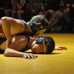 Grace Christians Jackson Reger controls Homers Skyler Shadle during a dual meet Thursday, Nov. 1, 2018 at Homer High School in Homer, Alaska. (Photo by Megan Pacer/Homer News)