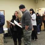 Homer residents wait in line to cast their votes in the 2018 midterm election Tuesday, Nov. 6, 2018 at Homer City Hall in Homer, Alaska. (Photo by Megan Pacer/Homer News)