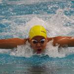 Homers Alia Bales races the butterfly leg in the girls 200-yard medley relay Saturday, Nov. 3, 2018 at the ASAA swimming and diving state championships at Bartlett High School in Anchorage, Alaska. (Photo by Joey Klecka/Peninsula Clarion)