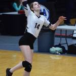 Homers Laura Inama unleashes a serve against Barrow at the Class 3A state volleyball tournament Friday, Nov. 9, 2018 at the Alaska Airlines Center in Anchorage, Alaska. (Photo by Joey Klecka/Peninsula Clarion)
