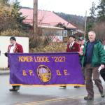 Members of the Homer Elks Club march in a Veterans Day parade Sunday, Nov. 11, 2018 in Homer, Alaska. (Photo by Megan Pacer/Homer News)