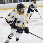 Homers Fiona Hatton looks up the ice during a game against Service High School during the first night of the End of the Road Shootout on Thursday, Nov. 15, 2018 at Kevin Bell Arena in Homer, Alaska. A freshman, Hatton scored her first goal Thursday and was awarded the game puck. (Photo by Megan Pacer/Homer News)