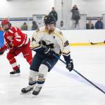 Homers Ethan Pitzman skates with the puck during the last game of the End of the Road Shootout, against Wasilla, on Saturday, Nov. 17, 2018 at Kevin Bell Arena in Homer, Alaska. (Photo by Megan Pacer/Homer News)