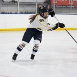 Homer defender Haylee Owen passes the puck to a teammate Friday, Nov. 16, 2018 during a agame against Kenai Central High School during the End of the Road Shootout at Kevin Bell Arena in Homer, Alaska. (Photo by Megan Pacer/Homer News)