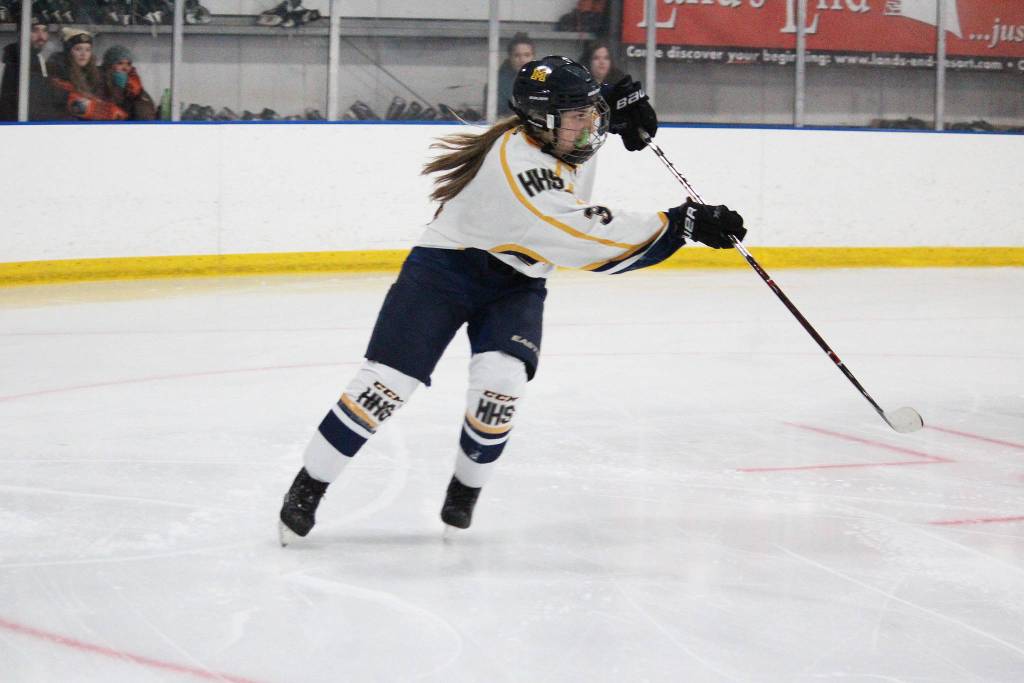 Homer defender Haylee Owen passes the puck to a teammate Friday, Nov. 16, 2018 during a agame against Kenai Central High School during the End of the Road Shootout at Kevin Bell Arena in Homer, Alaska. (Photo by Megan Pacer/Homer News)