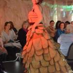 Christine Kulcheski models Brailer Dress by Cassie Brooks of NOMAR at the 2018 Wearable Arts on Nov. 17, 2018, in Homer, Alaska. (Photo by Michael Armstrong/Homer News)