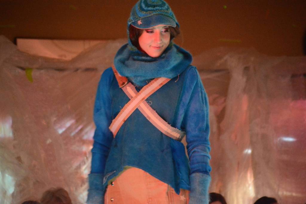 Taylor Andrade models Pioneer Avenue Reflection by Kari Multz at the 2018 Wearable Arts on Nov. 17, 2018, in Homer, Alaska. (Photo by Michael Armstrong/Homer News)