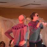 Craig Phillips, left, and Adele Person model Modern Icelandic Yoke Sweathers #1 and #2 by Ginger VanWagoner at the 2018 Wearable Arts on Nov. 17, 2018, in Homer, Alaska. (Photo by Michael Armstrong/Homer News)