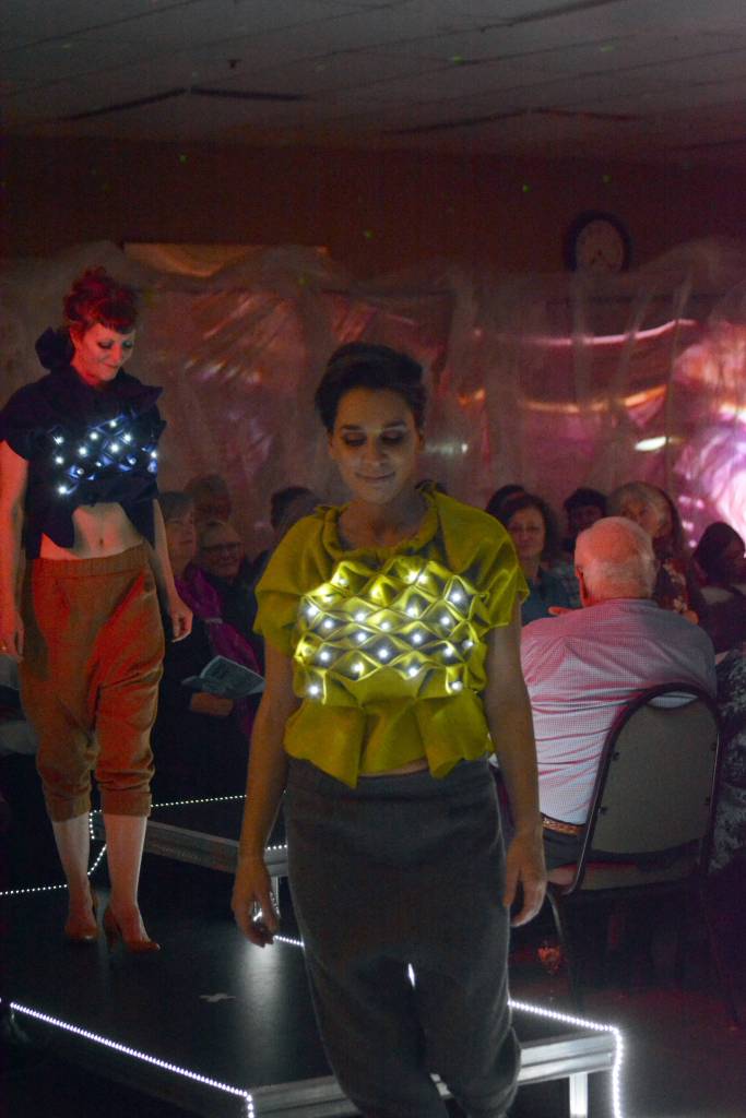 Mandy Bernard, left, models her Soft Sculpture, Blue and Rebekah Tufares, right, models Bernards Soft Sculpture, Chatruese at the 2018 Wearable Arts on Nov. 17, 2018, in Homer, Alaska. (Photo by Michael Armstrong/Homer News)