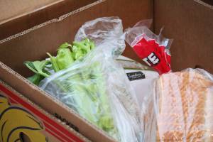 Ingredients sit in one of the many boxes filled with food by the Kachemak Bay Lions Club for their annual Thanksgiving baskets Saturday, Nov. 17, 2018 at the Homer United Methodist Church in Homer, Alaska. (Photo by Megan Pacer/Homer News)