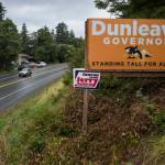 <span class="neFMT neFMT_PhotoCredit">Juneau Empire file photo</span>                                A sign supporting Mike Dunleavy for governor is seen in September. The state of Alaska has settled a lawsuit brought by the ACLU, a Palmer man and a pro-Dunleavy group regarding political signs that violate the states anti-billboard law.