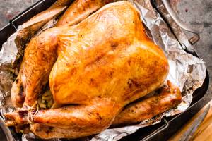 This undated photo provided by Americas Test Kitchen in October 2018 shows a roast turkey in Brookline, Mass. This recipe appears in the cookbook ATB Holiday Entertaining. (Daniel J. van Ackere/Americas Test Kitchen via AP)