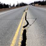 A long crack stretches along a length of road in Nikiski, Alaska on Friday, Nov. 30, 2018 due to a 7 magnitude earthquake that shook the Kenai Peninsula, along with the Anchorage, Wasilla and Palmer areas. (Photo by Victoria Petersen/Peninsula Clarion)