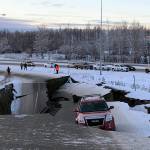 A car A car belonging to Homer resident Tom Sulczynski is trapped on a collapsed section of the offramp of Minnesota Drive in Anchorage, Friday, Nov. 30, 2018. Back-to-back earthquakes measuring 7.0 and 5.8 rocked buildings and buckled roads Friday morning in Anchorage, prompting people to run from their offices or seek shelter under office desks, while a tsunami warning had some seeking higher ground. (AP Photo/Dan Joling)