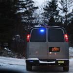 The vehicle of an emergency responder flashes its lights on Lake Shore Drive in Homer, Alaska, following a tsunami warning triggered by a 7.0 magnitude earthquake that struck 12 kilometers from Anchorage on Friday, Nov. 30, 2018. (Photo by Megan Pacer/Homer News)