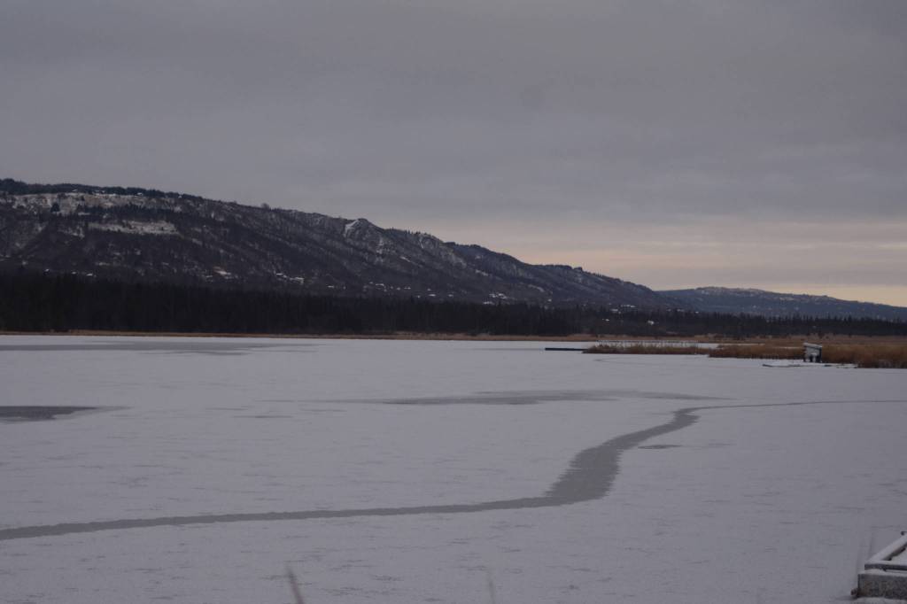 Cracks run across Beluga Lake after the earthquake on Friday, Nov. 30, 2018, in Homer, Alaska. (Photo by Michael Armstrong/Homer News)