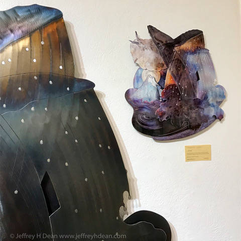 One of Jeffs Creative Edge Metal prints, right, beside the original wall sculpture. (Photo provided)