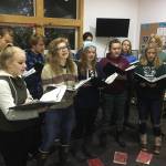 The Homer High School Swing Choir performs Friday, Nov. 30, 2018 at the Homer chamber of Commerce and Visitor Centers Holiday Tree Lighting event in Homer, Alaska. (Photo by Megan Pacer/Homer News)