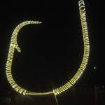 The halibut hook at the Homer Harbor has been wrapped in lights for the dark winter on Nov. 17, 2018, in Homer, Alaska. (Photo by Michael Armstrong/Homer News)