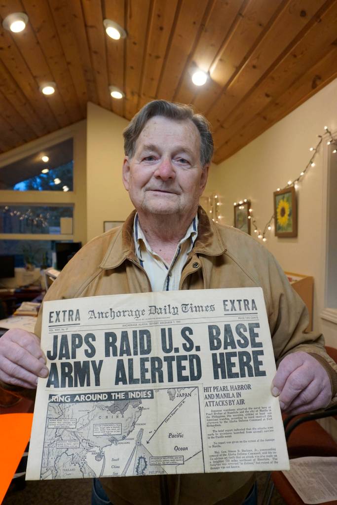 Jim Hadley holds a copy of the Dec. 7, 1941, Anchorage Daily Times reporting the bombing of Pearl Harbor. Hadley, 84, was 7 and living in Anchorage when the Japanese bombed Hawaii, causing the United States to declare war on Japan and enter World War II. Hadley visited the Homer News on Dec. 7, 2018, to share the newspaper with the staff. (Photo by Michael Armstrong/Homer News)