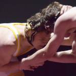 Voznesenkas Anthony Kalugin locks horns with Eliot Merriner of Grace on Saturday, Dec. 8, 2018 in the 171-pound championship at the Kachemak Conference wrestling tournament at Grace Christian High School in Anchorage, Alaska. (Photo by Joey Klecka/Peninsula Clarion)