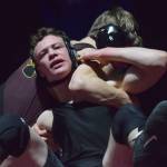 Nikiskis Koleman McCaughey fights against Graces Gabe Martin on Saturday, Dec. 8, 2018 in the 160-pound championship at the Kachemak Conference wrestling tournament at Grace Christian High School in Anchorage, Alaska. (Photo by Joey Klecka/Peninsula Clarion)