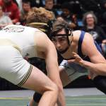 Soldotna senior Gideon Hutchison takes on Souths Jacob Shack in the 130-pound final Saturday, Dec. 15, 2018 at the Div. I state wrestling championships at the Alaska Airlines Center in Anchorage, Alaska. (Photo by Joey Klecka/Peninsula Clarion)